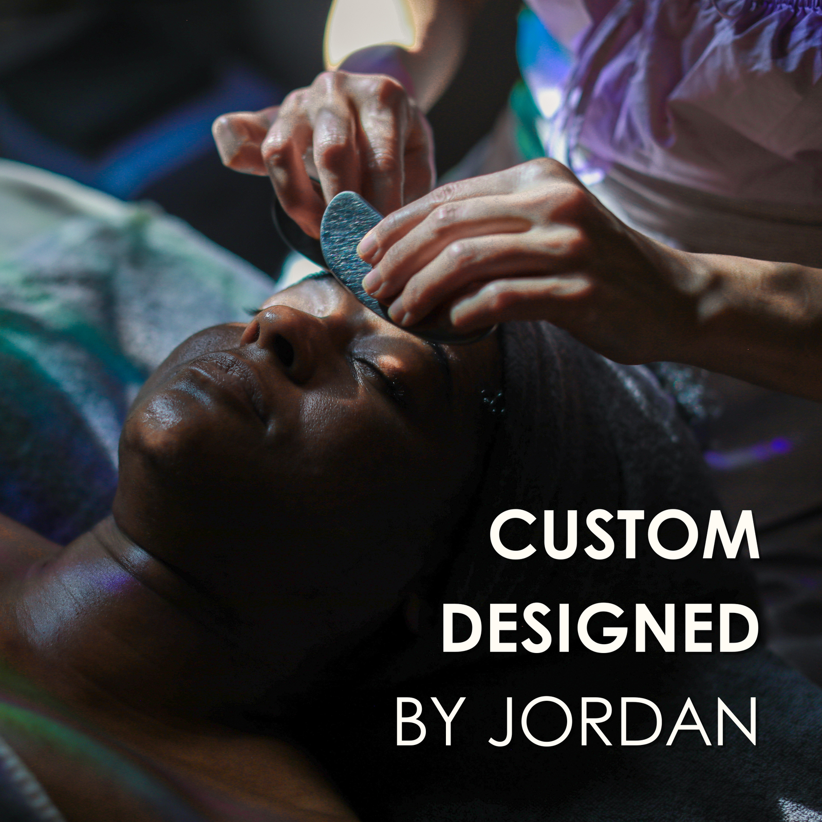 Esthetician Jordan LaFragola performing a facial treatment using the Flora Mirabilis Beauty Tool on a client, with text stating ‘Custom designed by Jordan.