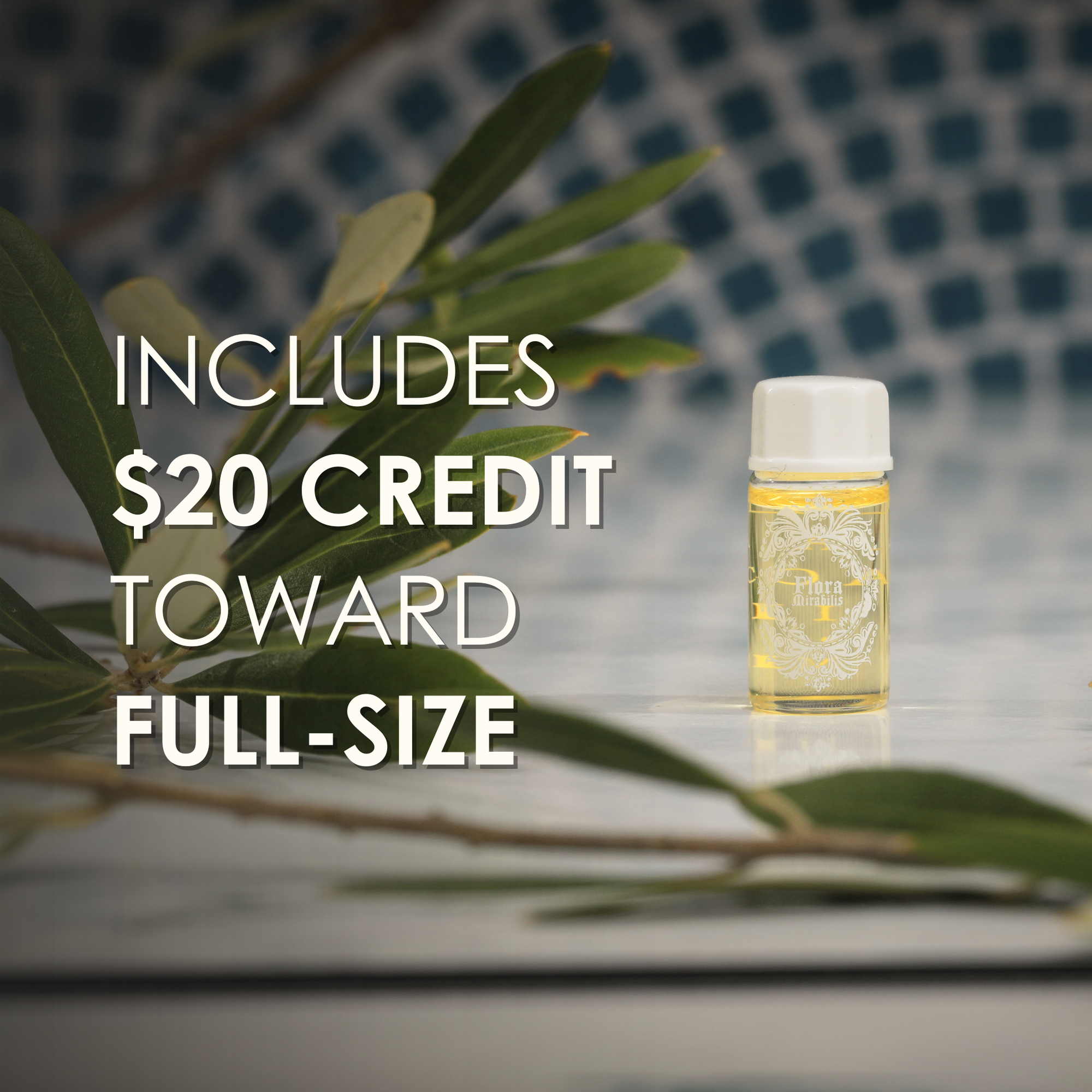 Flora Mirabilis Holy Grail Face Oil trial-size vial on marble surface with olive branches and text overlay stating ‘Includes $20 credit toward full-size.